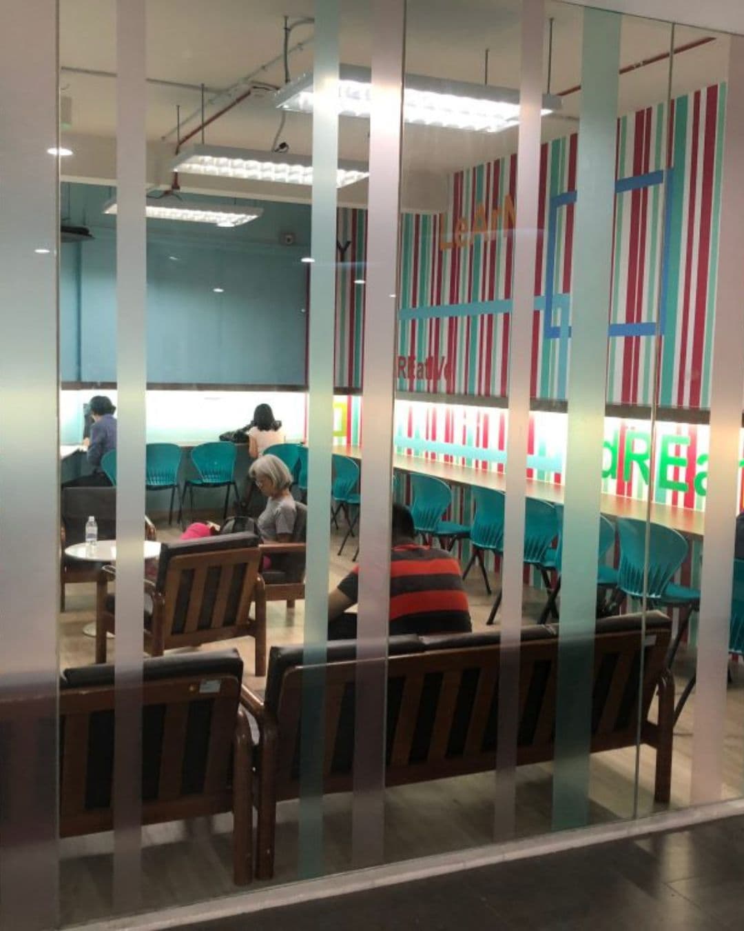 Nee Soon East Community Club – Glassy and Airy Study Room Glass-walled study room at Nee Soon East Community Club with mixed seating options